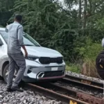 woman drives car on railway track towards Bengaluru- Hyderabad