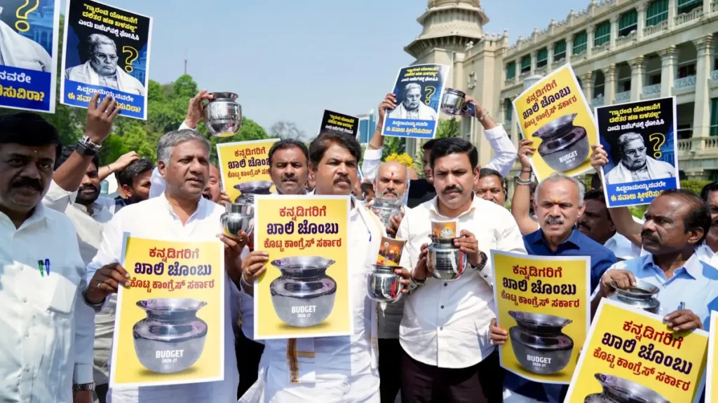 Budget; Ar. Ashoka, B.Y. Vijayendra angered by holding mug
