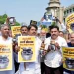 Budget; Ar. Ashoka, B.Y. Vijayendra angered by holding mug